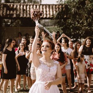 Bride about to throw bouquet.